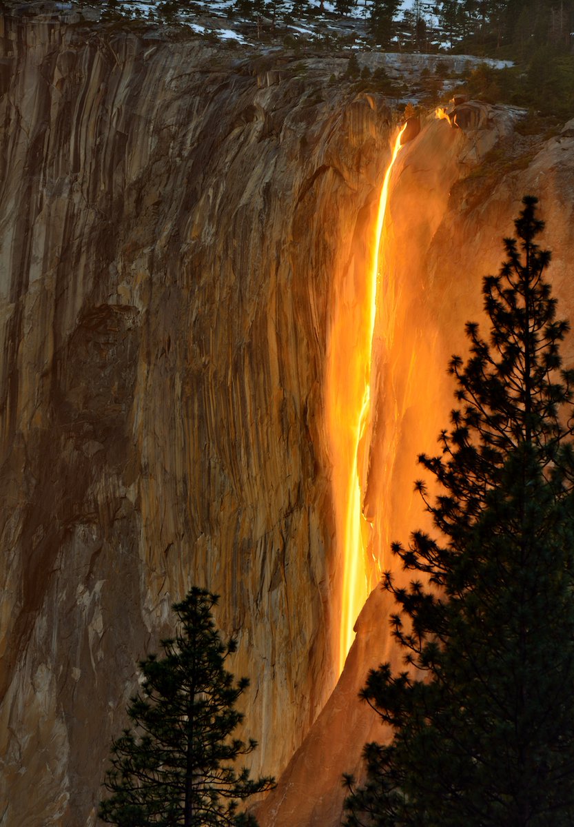 Interior's tweet image. For a short time in February — if the conditions are perfect — Horsetail Falls at @YosemiteNPS appears to be set ablaze when the sun’s light hits the waterfall at just the right angle, illuminating the water and mist to a brilliant orange fiery glow. 

Photo by Nikhil Shahi