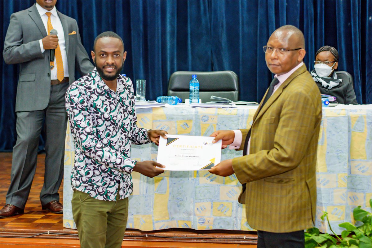 danielnyoro2's tweet photo. Receiving My EARB  Cert. From @RichardKiambi (EARB Board Member) at Kenya School of Monetary Studies. 

#EARB #estateagents #EarthquakeInVihiga https://t.co/9Dpi7ol5yc