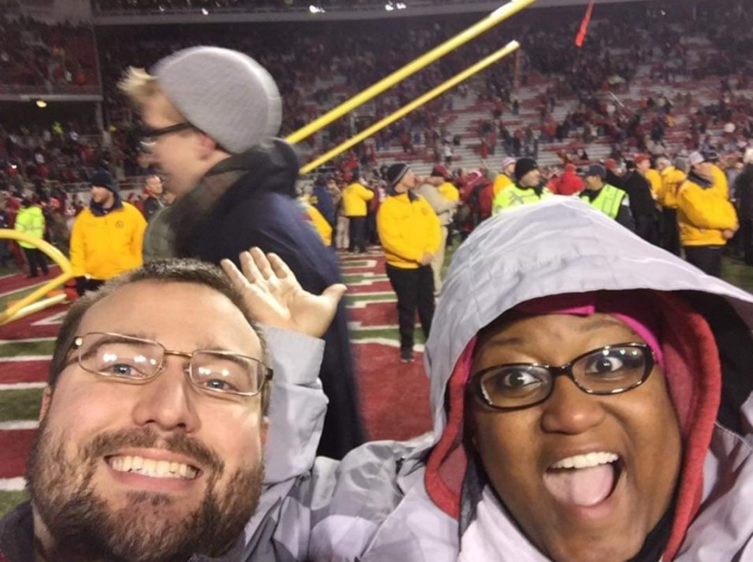 Sarahfranswans1's tweet photo. This is why you storm the court. My friend Shaun died Sunday, he was one of the biggest Hog fans out there. This is him and his wife Shae after the '14 LSU game when we stormed the field. Life is short, hug your people, storm the court and Go Hogs! @EricPMusselman https://t.co/nSVfRFv0Vv
