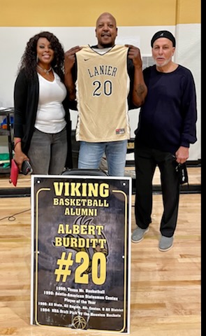 ViksBasketball's tweet photo. Great night for Viking Basketball!  We honored Albert Burditt, one of the all-time greats of Austin high school basketball, who went on to star at UT!  On hand to celebrate with Albert and his wife Stephanie was his high school coach, Ernie Azios! https://t.co/fFEWMipCUH