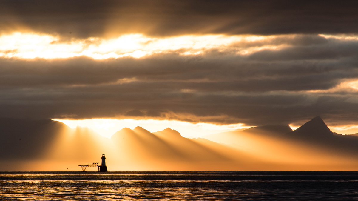 Good morning #CapeTown . Sunrise over False Bay, <a href="/Romanrocklight/">Roman Rock Lighthouse</a> showing off with a theatrical backdrop this morning!