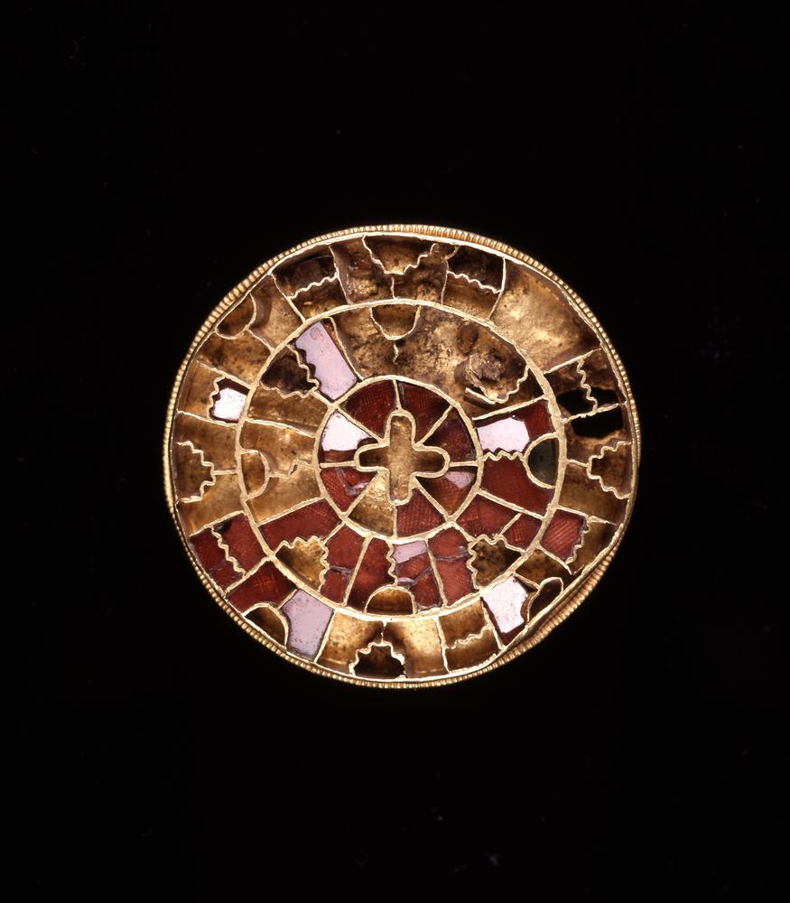 Gold brooch with garnets, Merovingian or Lombardic, 6th-7th century AD from The British Museum. Source: britishmuseum.org.