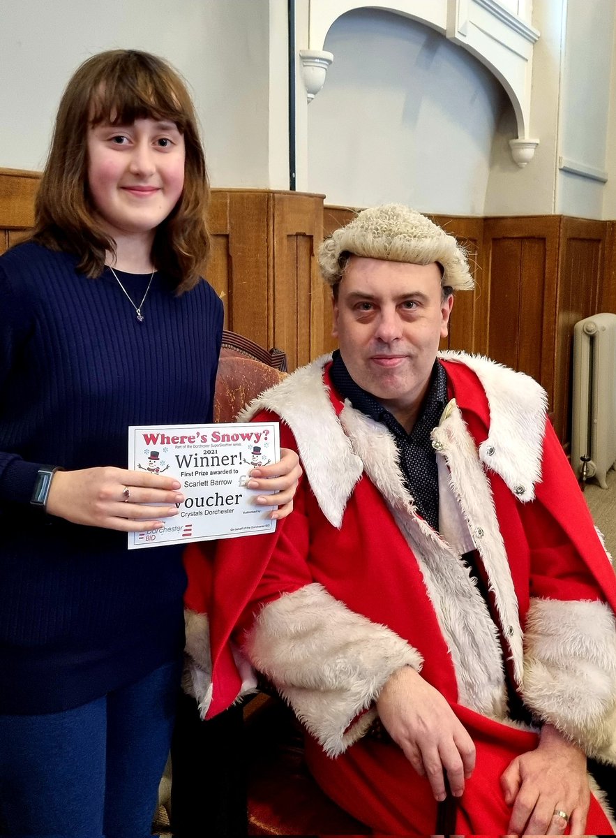 I love this photo of our excellent <a href="/DorchesterBID/">Dorchester BID</a> Chairman Neil <a href="/goldcrestjewell/">Goldcrest Jewellers</a> (who may have missed is vocation of being #JudgeJeffreys) with one of our #WheresSnowy prize winners, Scarlett Barrow