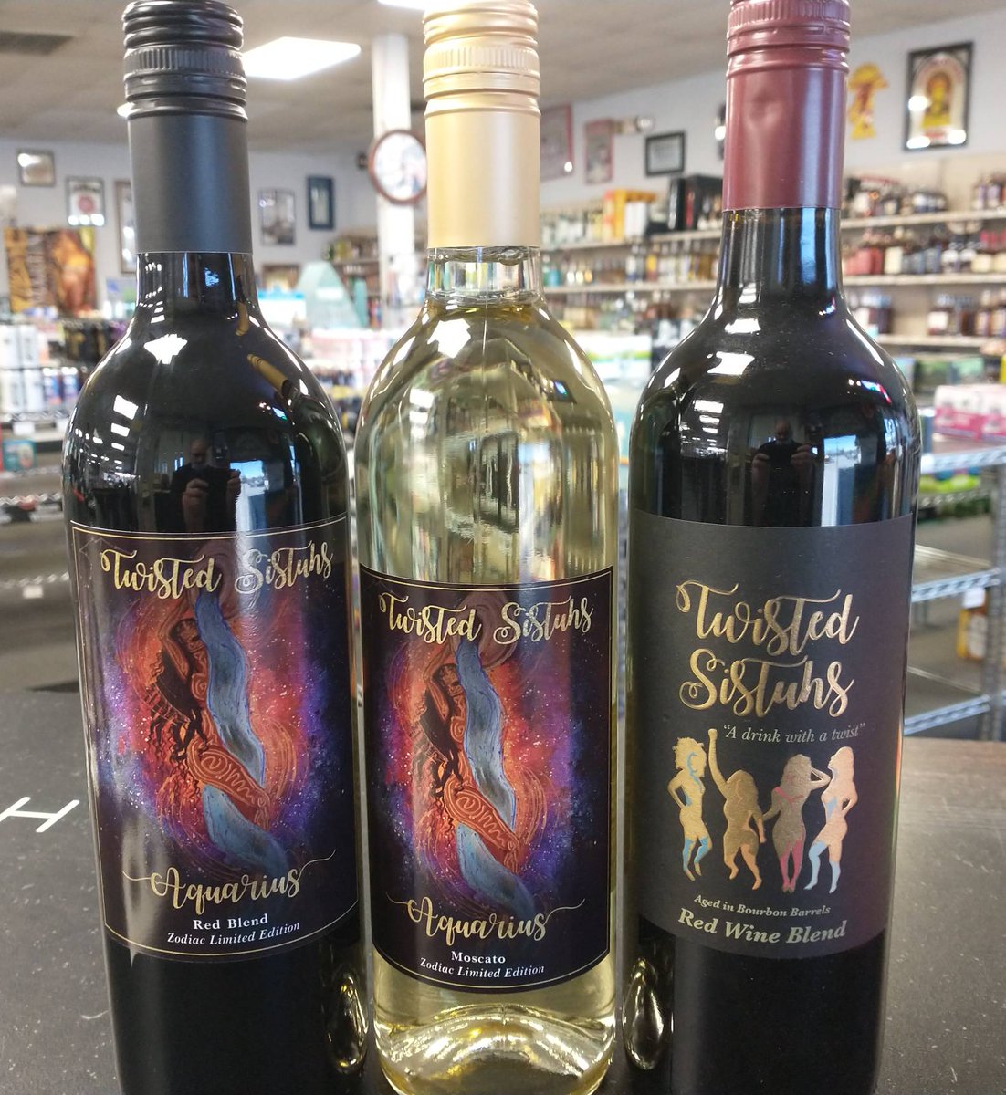PriestPointWine's tweet photo. Twisted Sistuhs Wine!! Red Blend, Moscato, and Red Blend aged in bourbon barrels!! We now have the Aquarius Zodiac Limited Edition bottles!! #staytwisted #twistedsistuhs #aquarius #ppws #priestpoint #drinklocal https://t.co/41pgP9Lwck