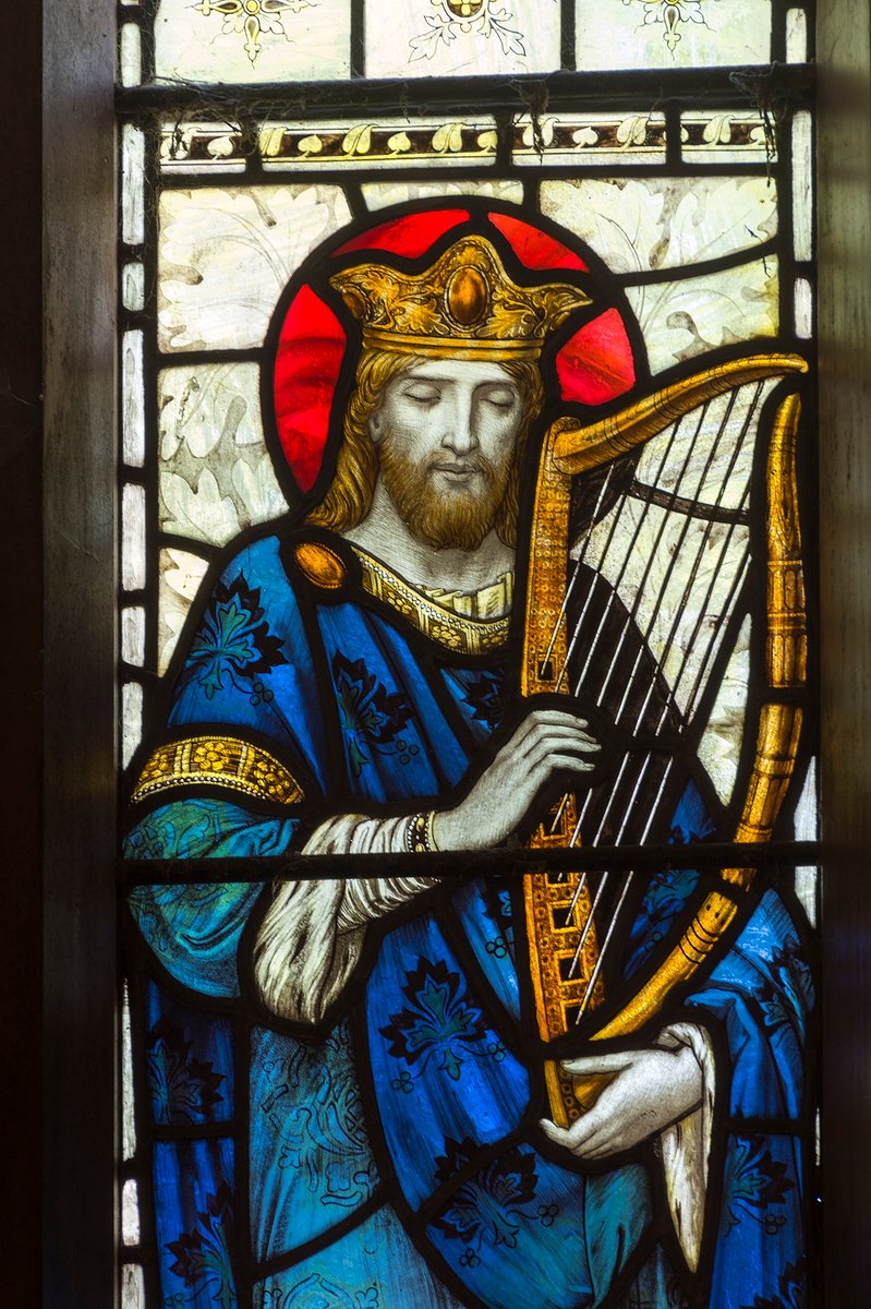 In royal blue robes, St David closes his eyes as he plucks on harp strings at the back of the north transept at St Cynhaearn's, Ynyscynhaearn, Gwynedd.

This jewel-coloured window was created by Powell & Sons in 1906.

#MusicInChurches #AnimalsInChurchesHour