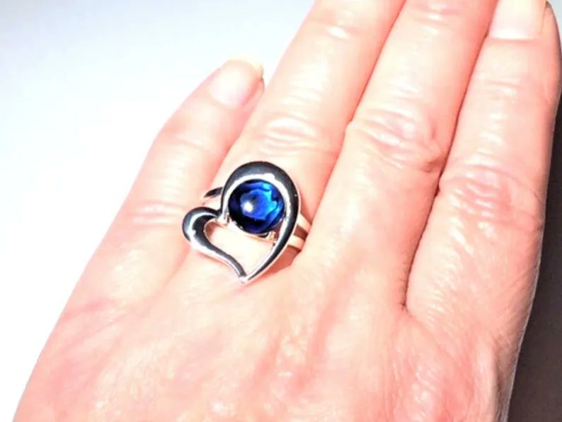 WickedFishBiz's tweet photo. Twisted Heart Ring in Abalone Blue by Wicked Fish Design https://t.co/McvpRXsTYV  - adjustable heart ring  to celebrate Valentine's Day!  #jewellery #jewelrydesigner #instajewelry #lovejewelry #jewelryhandmade #shellring #abalone #valentinesday #valentines #wickedfishdesign https://t.co/niUxpNNBTy