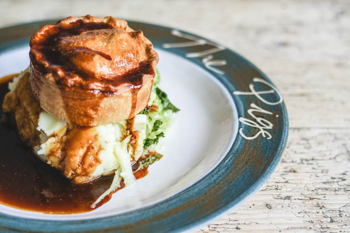 Say hello to the  Game and Guinness Pie, served with buttered mash and seasonal greens🥧 

Book your table: thepigs.org.uk/food
