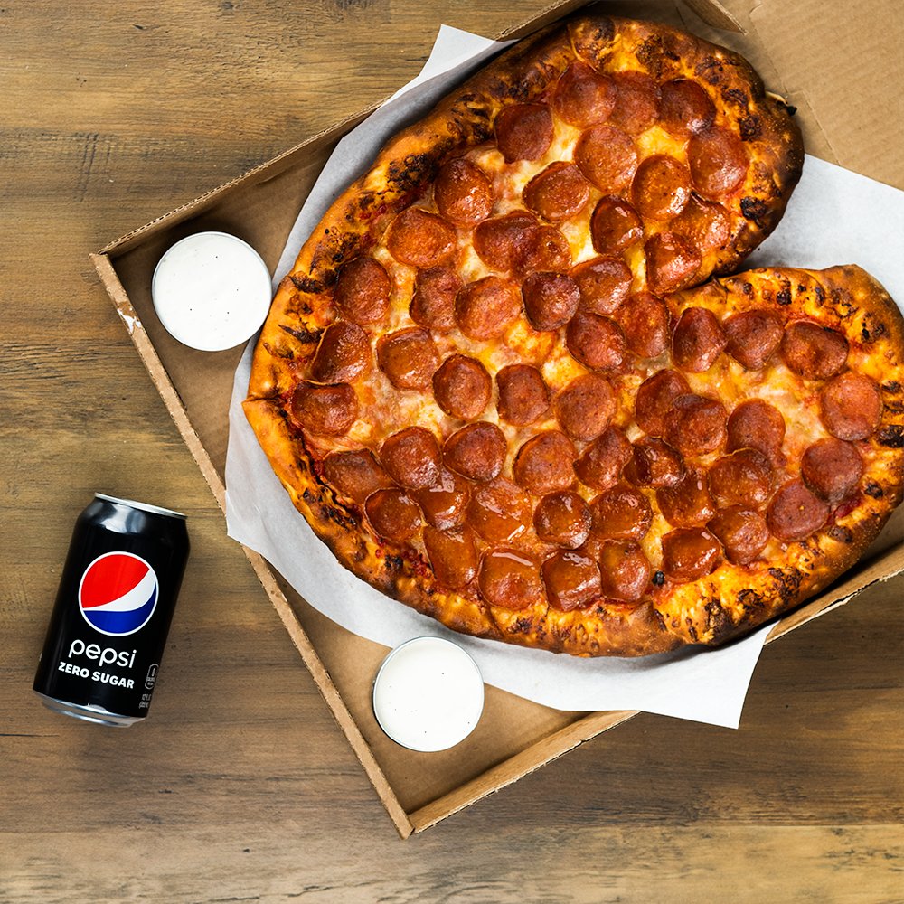 You’ll always have a pizza of our heart. #NationalPizzaDay #BetterWithPepsi