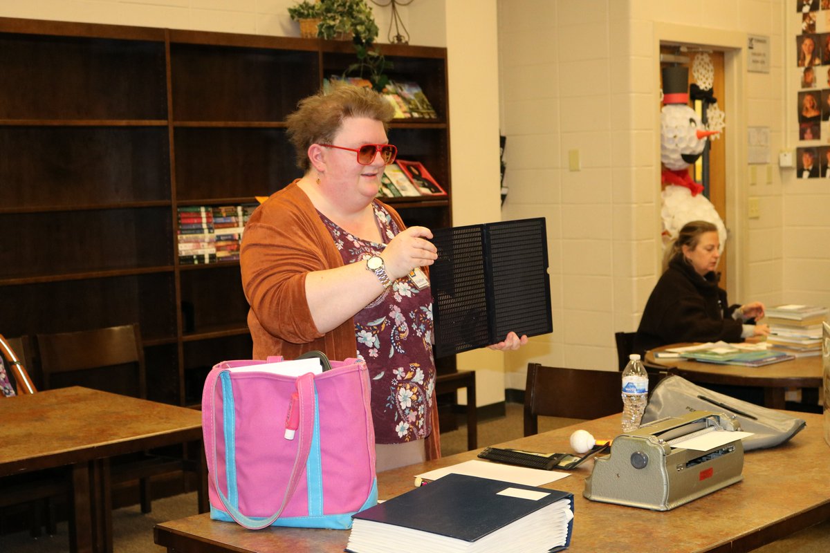 PACSWolverines's tweet photo. In observation of World Braille Month, Prince Media Specialist Danny Delgado hosted guest speaker Laney Nipper, President of the GA Council of the Blind. Ms. Nipper explained the basics of how braille is used in the daily life of a person who is visually impaired. #pacsacademics https://t.co/Fpkhe1nEg0