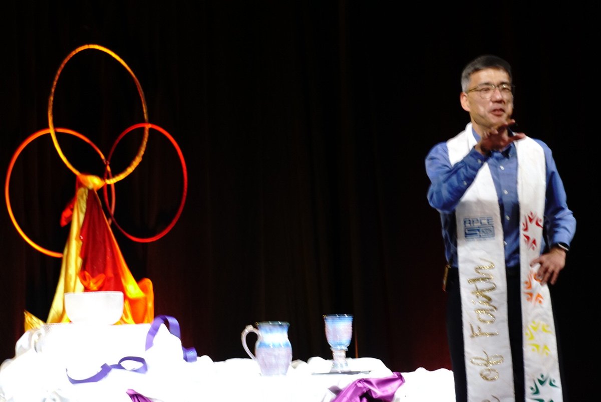 Raveler1's tweet photo. #APCE22 Rev. Dr. Rodger Nishioka giving the response to the sermon - "the best preachers hold up pictures of our world and show us the picture of hope within" https://t.co/QpMIJUhoUw