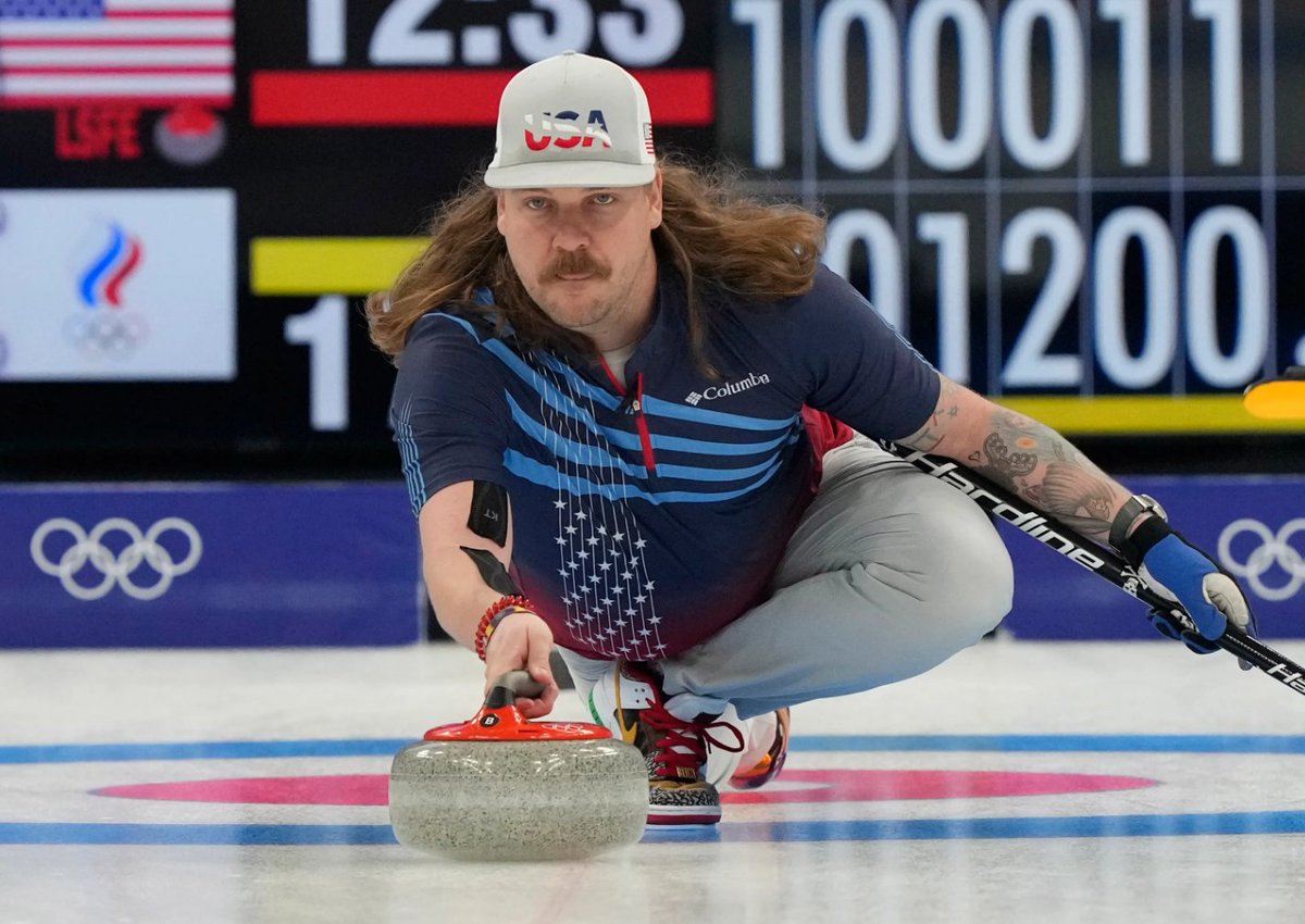 USATODAY's tweet photo. Does anyone on Team USA have better style than curler Matt Hamilton?

Hamilton helped the USA beat the Russia Olympic Committee 6-5 in the men’s first round robin session in Beijing. https://t.co/ZWpbyz63iG