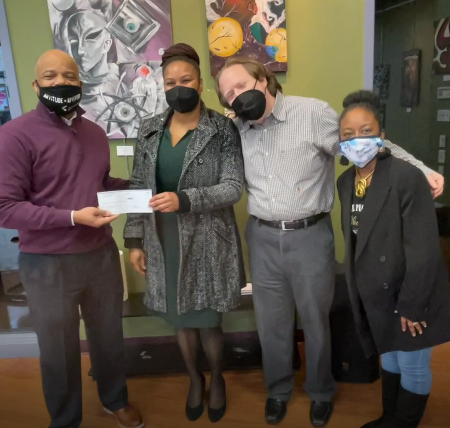 Cinnaire VP of Comm. Dev. Dionna Sargent presents CCAC Exec. Dir.  Rhodes with an investment in our mission! Also pictured: Shysheika Edwards, Education Dir. &amp; Bryan Abramson, Development Mgr. 
#inwilm #supportlocalarts #artstransform #artsmatter #delawarearts #corporatesupport