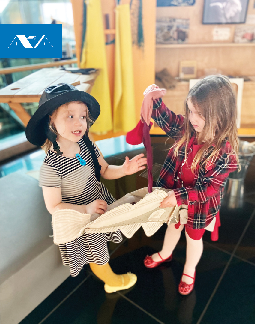 TheRooms_NL's tweet photo. Help us caption this photo of two little visitors exploring our Culture Kiosks on Level 3. #RoomToReconnect #CaptionThis https://t.co/kNzjaNX5rR