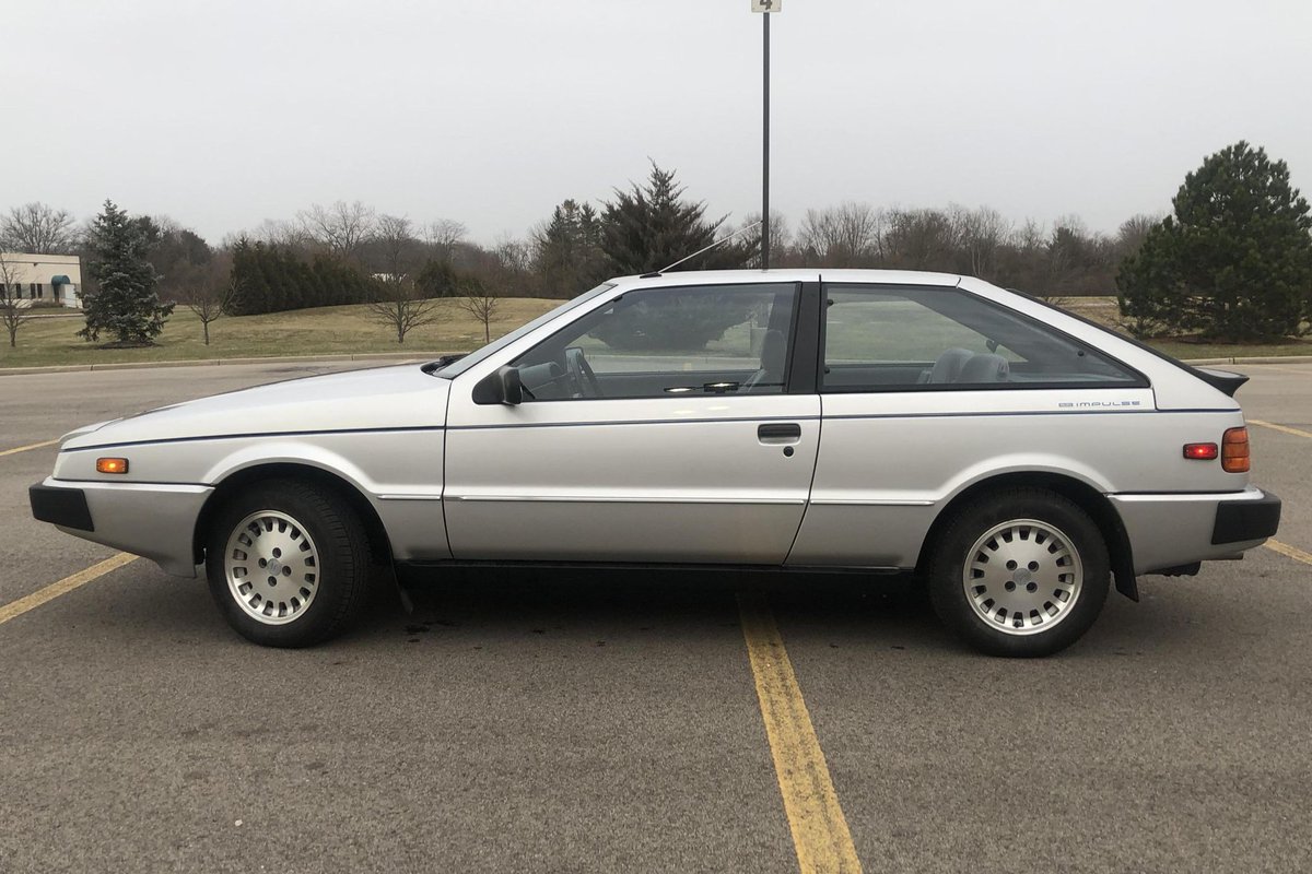 DougDeMuro's tweet photo. Now live on @CarsAndBids: 1986 Isuzu Impulse with 9,200 miles. You will never, ever find this again. https://t.co/WQn7HJtB3Z https://t.co/YFIygENmfh
