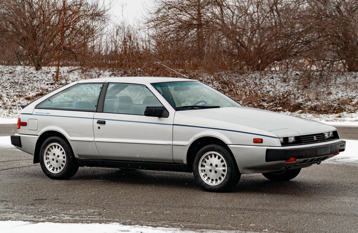 DougDeMuro's tweet photo. Now live on @CarsAndBids: 1986 Isuzu Impulse with 9,200 miles. You will never, ever find this again. https://t.co/WQn7HJtB3Z https://t.co/YFIygENmfh