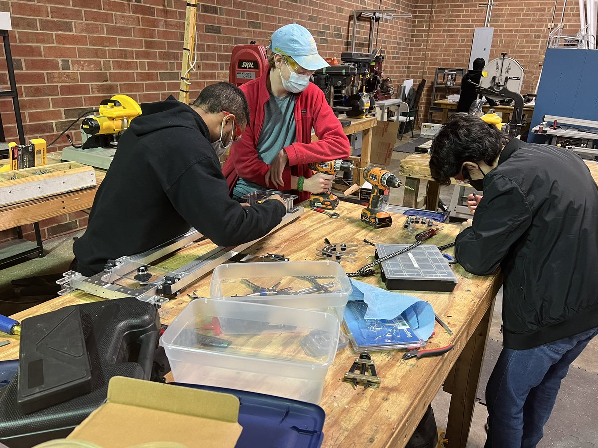 bart_carlson's tweet photo. We are looking good. Our elevator is coming together James and Conor,Devon under the watchful eyes of Mr Korey Gaddy and Ms. Ginina. Rishi on the CNC cutting out the shooter to be built on Thursday night meet. Fredrick and Apple and Nolan are programming the lime light. https://t.co/kO3G4oomE9