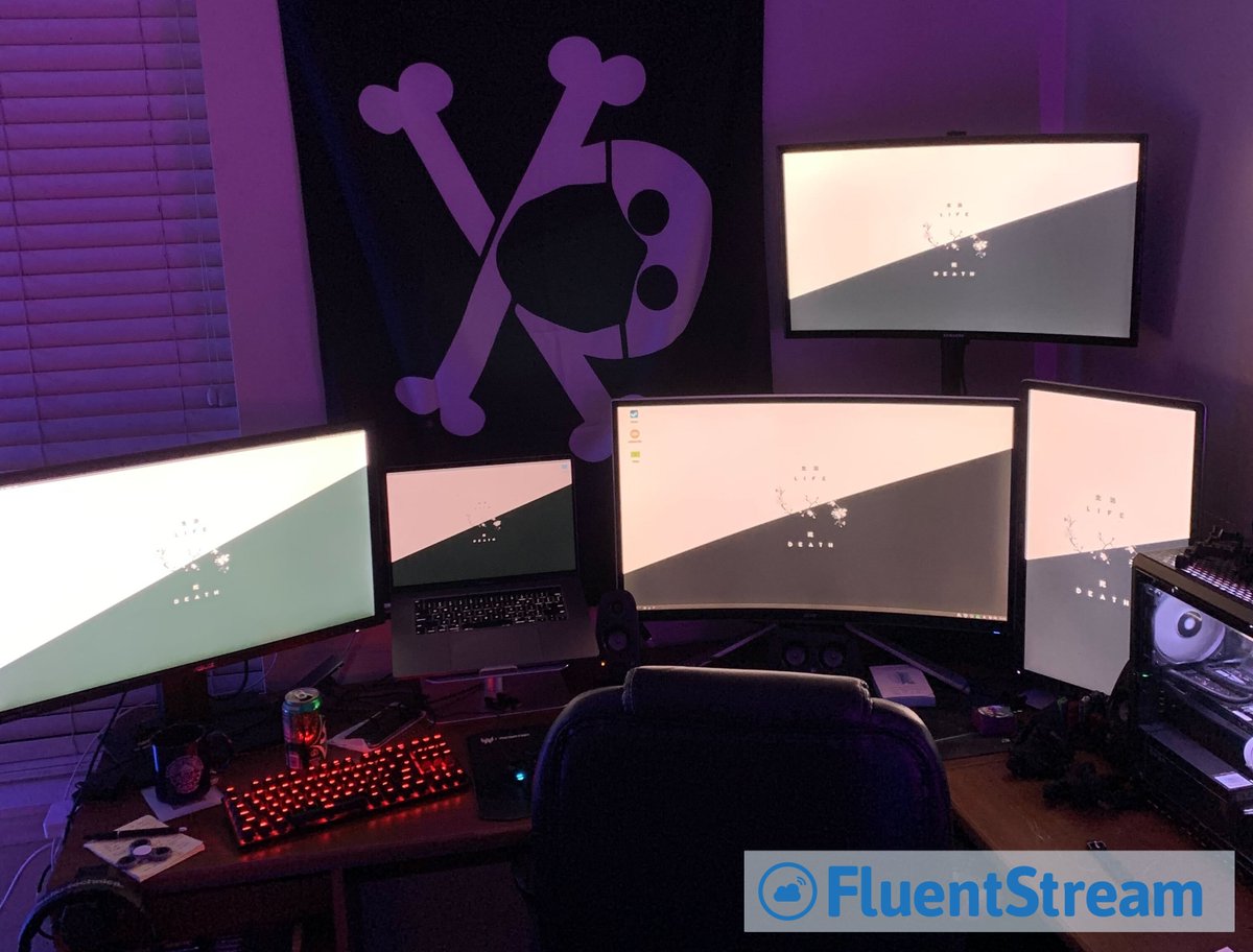 FluentStream's tweet photo. Your #codingdojo may be cool... but is it five monitors all of different sizes and angles that match your computer LEDs cool? 

This week's #WorkFromHomeWednesday is courtesy of our reigning FluentStream Superstar Brennan Link! 
#workingfromhome #employeespotlight #homeofficelife https://t.co/KbzikKnUN6