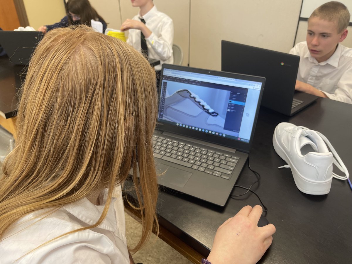 StMaryAvon's tweet photo. From paper to digital design to real life product! After sketching out how they would design their ideal pair of shoes, students had to recreate that digitally on their computers. Today, they took those digital illustrations and painted their designs on a real set of sneakers! https://t.co/NhB1XeiQLa
