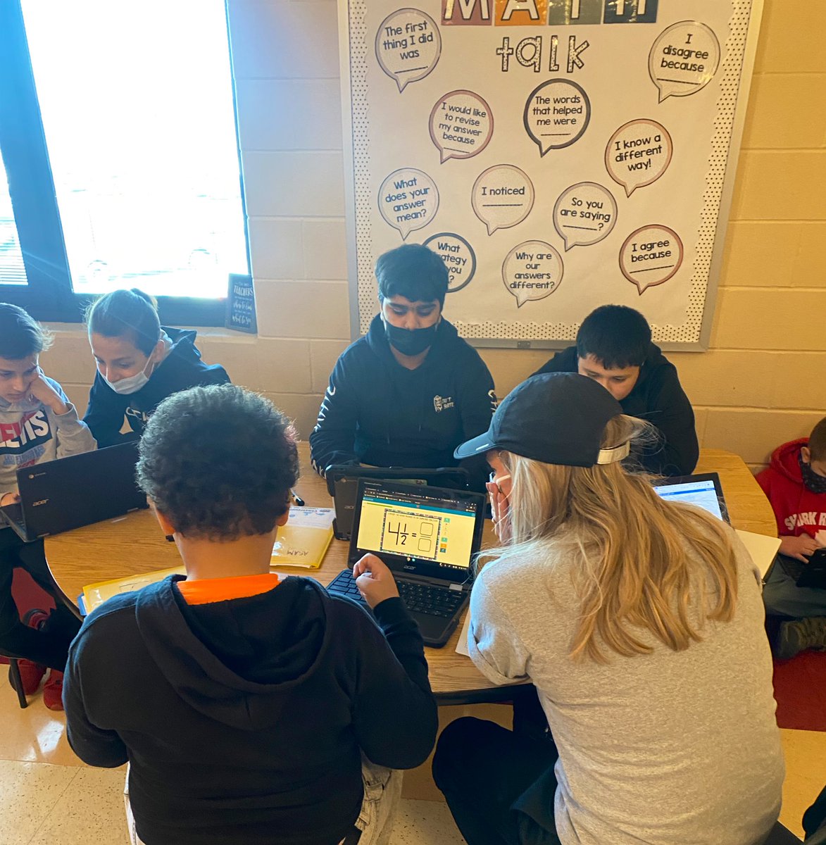 KaraKowalk's tweet photo. Our 5th graders are rocking their Fraction Boom Cards with Miss Overberg! They were so excited to tell why they were “MAD” (multiply, add, denominator) at math today!👏🏼 #WEareLakota @Flying5th https://t.co/rREfa59EQ8