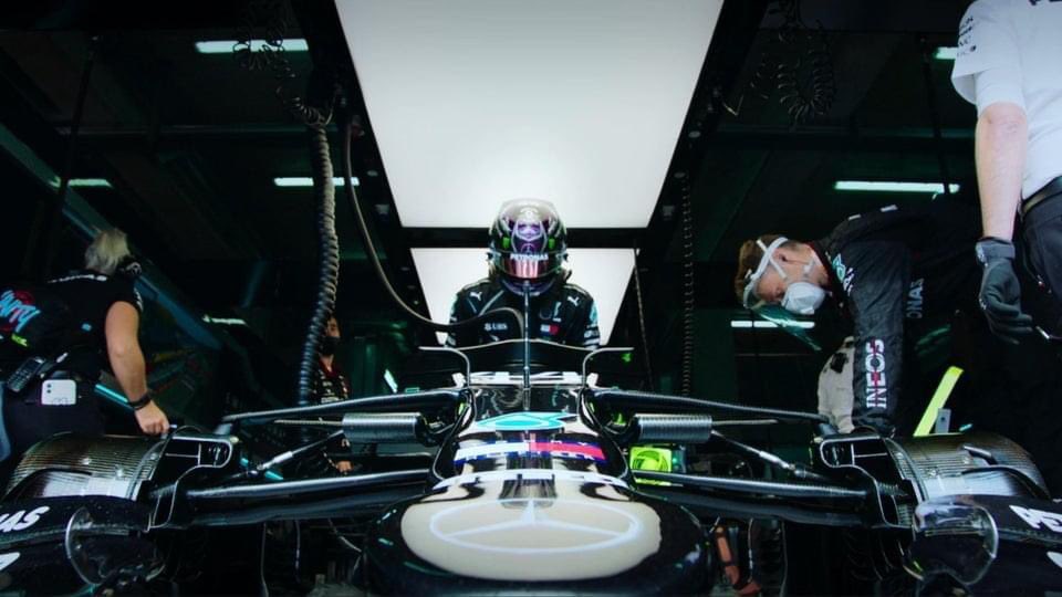 #WeStandWithLewisHamilton