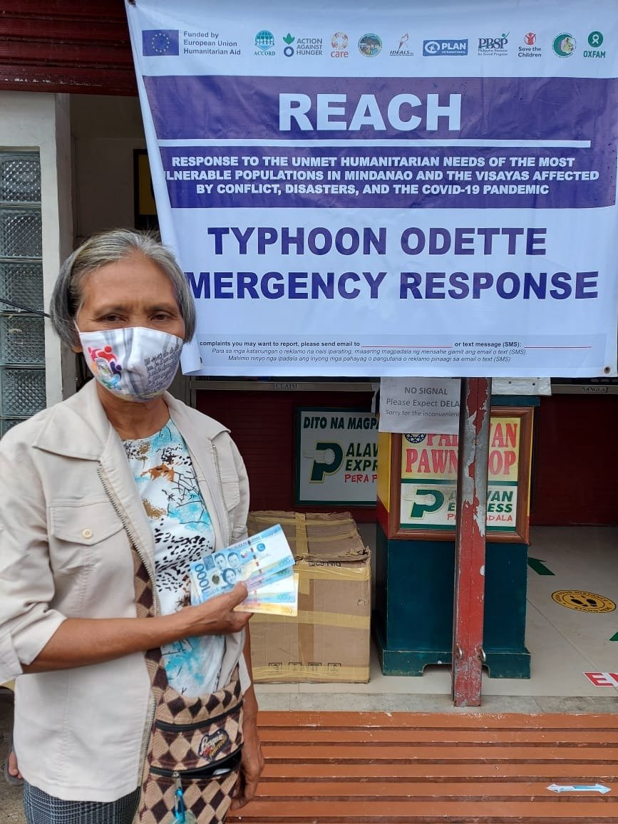 planphilippines's tweet photo. TODAY: Distribution of Multi-Purpose Cash Transfers (MPCT) for families affected by #TyphoonRai #OdettePH in Liloan and Libagon, Southern Leyte, through the #REACH project funded by the European Union. https://t.co/T4rBfU5J2H
