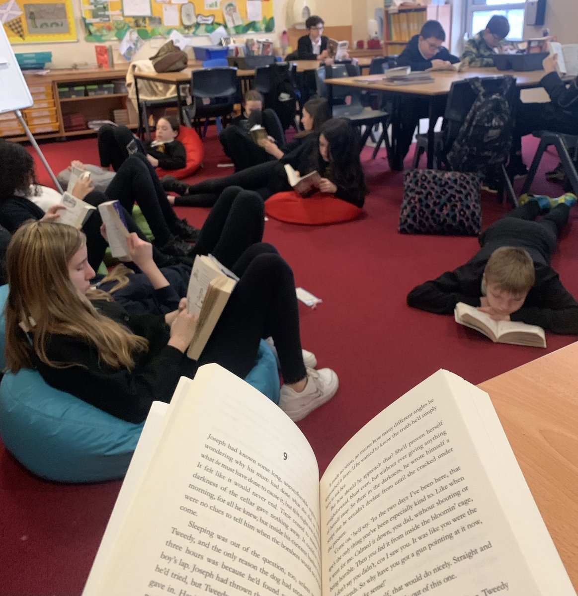 NetherburnPs's tweet photo. Our favourite way to start each day is with R&amp;R time (Read &amp; Relax) time. Pupils are always given the option to read their personal books wherever they prefer. Some love relaxing on the beanbags, others are happier sitting at their desks.☺️📚 #comfyreading @OpenUni_RfP @jillmq80 https://t.co/tJf7RrF6hN