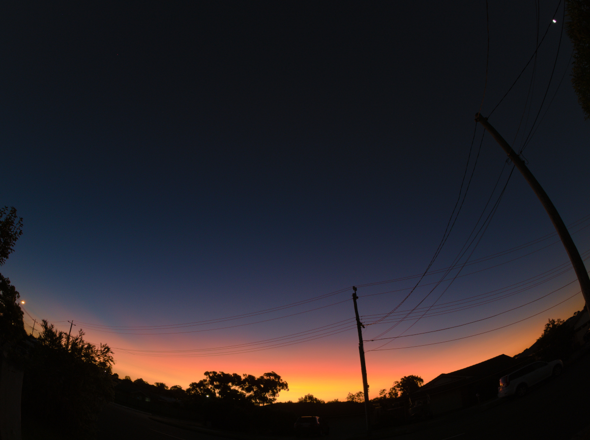 I wonder if this is dust from the Tunga Ha‘apai volcanic eruption last month?  What a spectacular evening twilight!