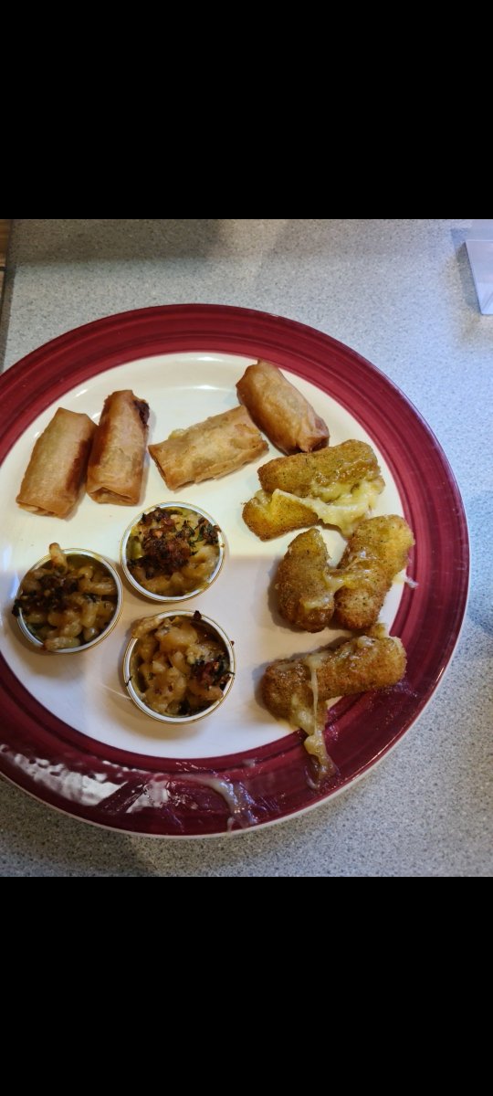 SUBMISSION #11 from Katrina P

2/10 

In what is the darkest day in this page's history, we are confronted with cheese dippers, pots &amp; Spring Rolls. A pondswamp of beige with no imagination, no colour &amp; frankly offensive presentation. Seek help Katrina. 
#vegan #ratemyveganplate
