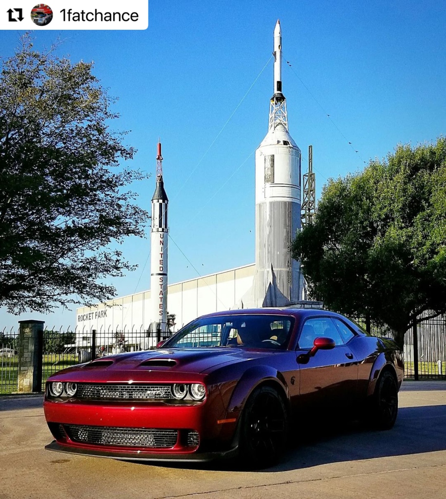LSMoparFest's tweet photo. "What makes this photo so awesome??? We're in a place that you can't get into (NASA - Johnson Space) with a car that wasn't out ( @dodgeofficial 797HP Redeye Challenger)."⁠
⁠
♻️ @1fatchance⁠
⁠
#LSMFwknd #NASA #RocketPark #Houston #HTown https://t.co/AI1xYXYML0