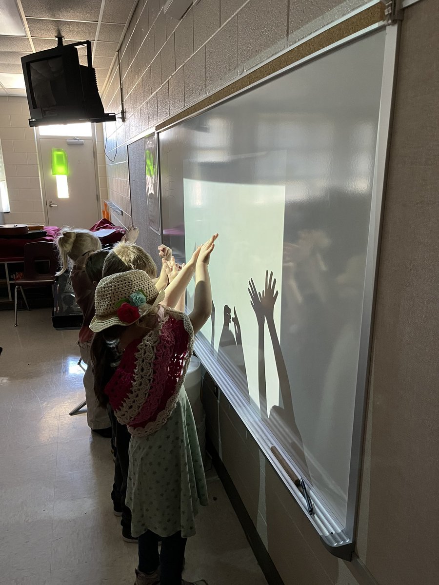 We had so much fun learning a song about shadows that we had to make some ourselves!