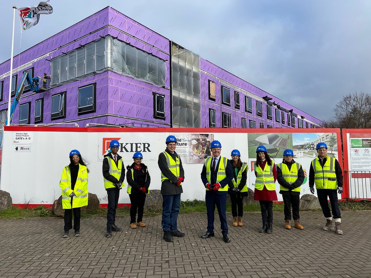 kierconstruct's tweet photo. The team at Fitzalan school were excited to welcome the Welsh Government Minister for Education, local Councillors &amp; pupils for a Topping out event. The pupils have been involved in the design of the school &amp; helped with the ceremony by the placing of the tree on the roof. https://t.co/iVmh4R99Sp