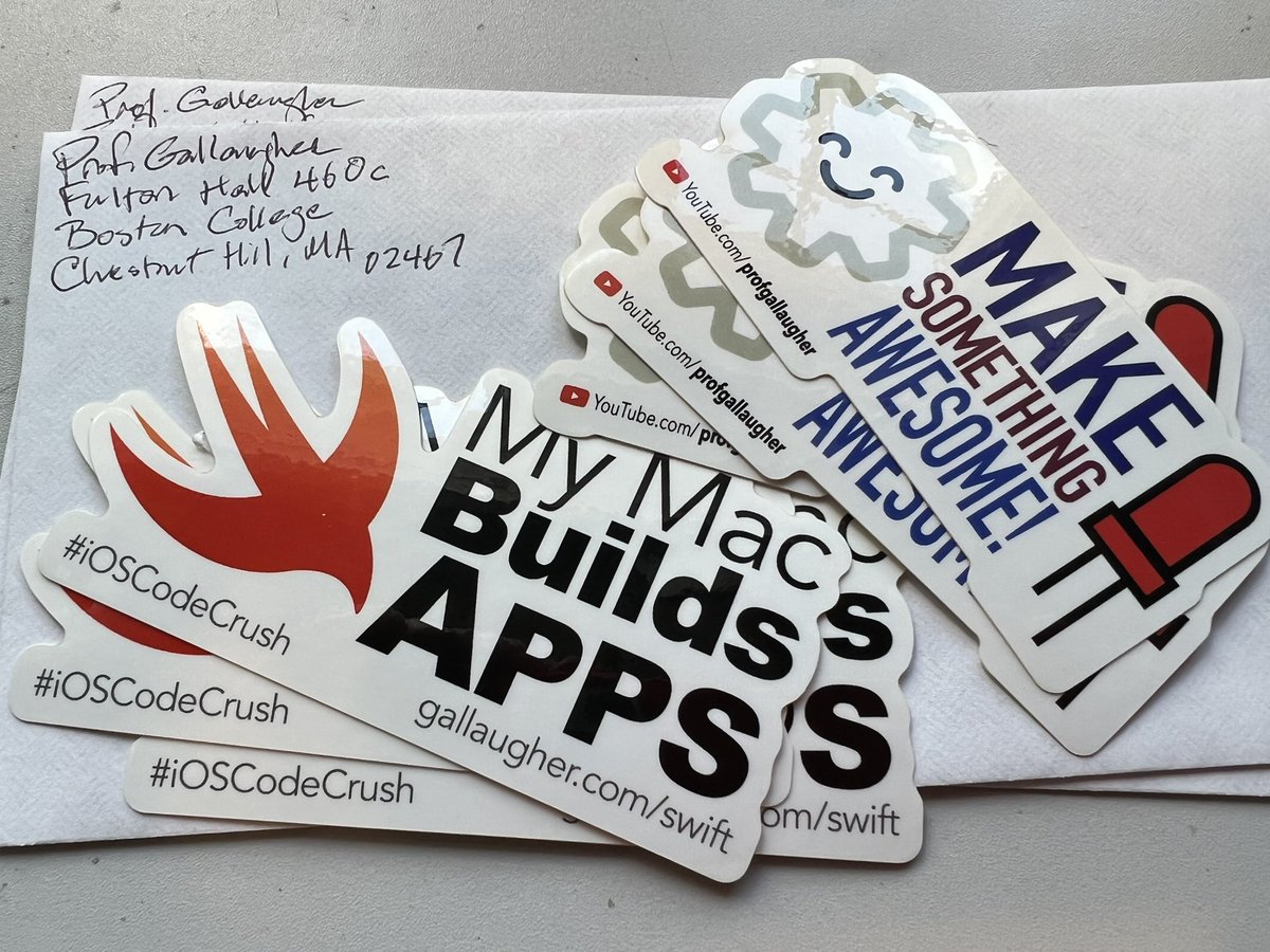 gallaugher's tweet photo. About to send out this week’s laptop stickers. Comin’ your way, Tim & Paul. #iOSCodeCrush #BuiltWithProfG https://t.co/6qZ66nSUCP