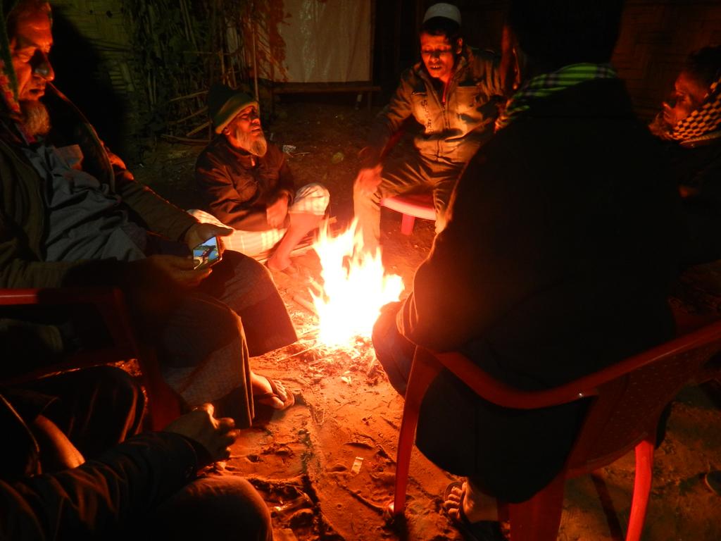 SahatZia_Hero's tweet photo. These people, one person from each family sit together to get fire warm and discuss about the ''Repatriation'' and future of ''Young Generation'' every night.

#Rohingya refugee camp, Cox's Bazar, Bangladesh.
#Winter #Refugees #RohingyaCrisis #Hope #RefugeeCrisis #Photography https://t.co/dDJZESJG29