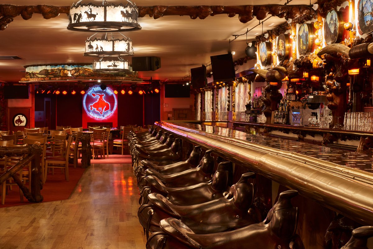 No trip to Jackson Hole is complete without visiting our sister bar, the iconic <a href="/cowboybarjh/">Million Dollar Cowboy Bar</a>. Guests of the Wort Hotel get in for free, just show the door greeter your room key!