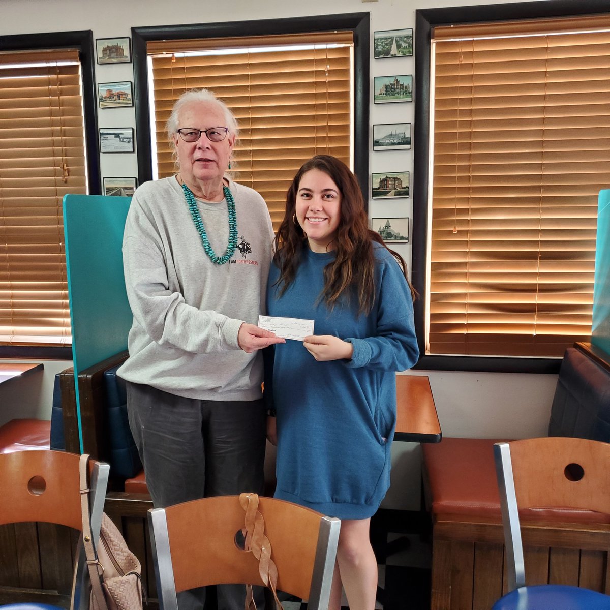 NWOSU_EDUCATION's tweet photo. Lenny Reed of the Woods County Retired Educators Association presenting a cash award to Maya Stewart.  The organization annually recognizes a student in NWOSU’s educator preparation program who is a graduate of a Woods County high school. https://t.co/TFAOg4PnZh