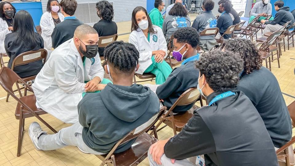 JPschools's tweet photo. .@the15whitecoats shared powerful, personal experiences w/ Thomas Jefferson Academy students about success in medical school &amp; life. Partnership w/ @CHNOLA created this unforgettable day for our students. #ForwardTogetherJP #BlackHistoryMonth https://t.co/YrWgwWcUW4