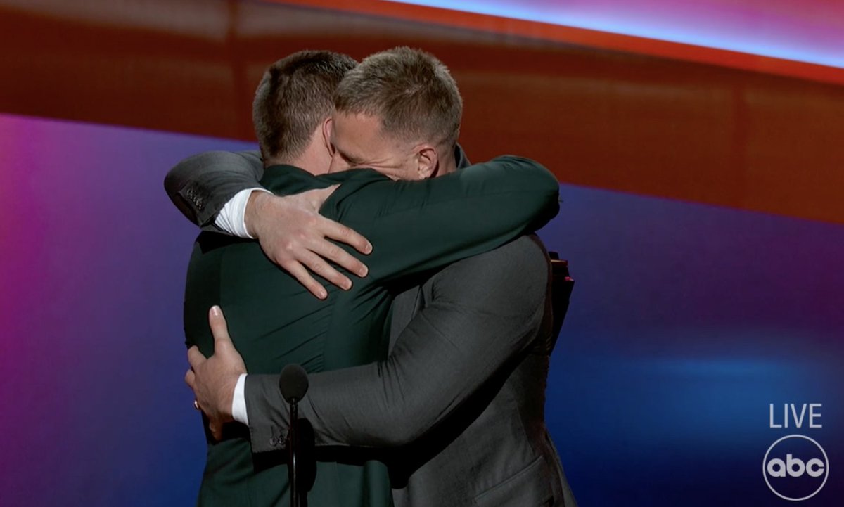 johnbreech's tweet photo. T.J. Watt takes home the defensive player of the year and J.J. got to hand him the trophy. Solid brother hug. https://t.co/qrzXc7YHut