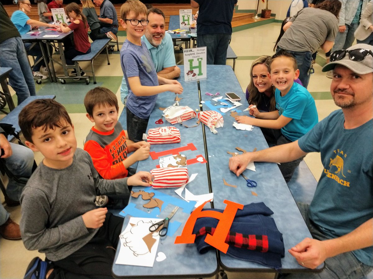 WallaceHESlib's tweet photo. What a fun night! An event full of families &amp; hamster activities...bots, Legos, races, crafts, photo booth, &amp; Bucky Bear. Makes me so happy that reading together brought all this about. Humphrey would say, "JOY-JOY-JOY!" #hesshinebright #HESOneSchoolOneBook #gcisdlib #gcisdreads https://t.co/q6bu1ekbka