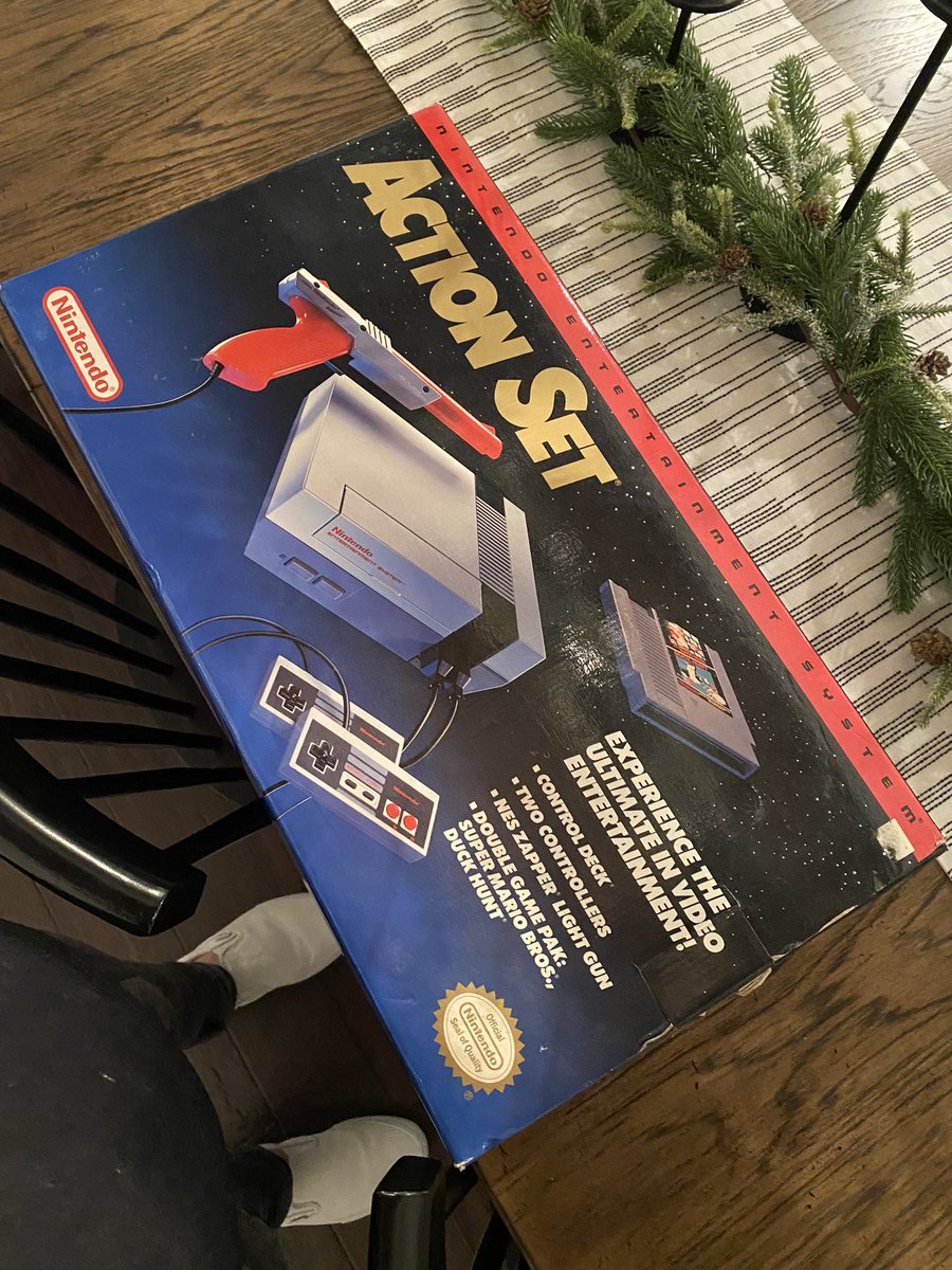 HarrisLue's tweet photo. Also reunited it with the original accessories and original box that my parents have had in their closet for longer than I’ve been alive! Still has the Nintendo Power pamphlet and Poster in tact! #Nintendo #ActionSet #NintendoPower https://t.co/zJm8ll1W8s