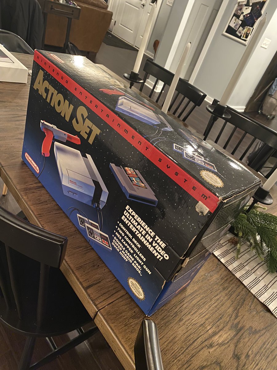 HarrisLue's tweet photo. Also reunited it with the original accessories and original box that my parents have had in their closet for longer than I’ve been alive! Still has the Nintendo Power pamphlet and Poster in tact! #Nintendo #ActionSet #NintendoPower https://t.co/zJm8ll1W8s