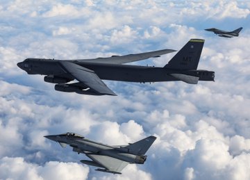 image shows RAF Fighter Jets alongside a U.S. Air Force B-52.