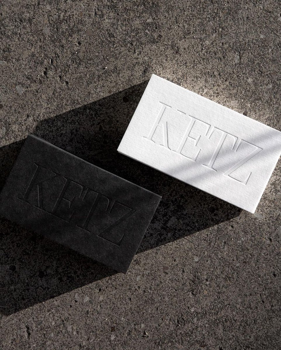 Crisp blind deboss business cards for Ketz Design on <a href="/colorplanpapers/">GF Smith Colorplan</a> Pristine White and Ebony in 700gsm, printed by <a href="/JotPaperCo/">Jot Press</a>.