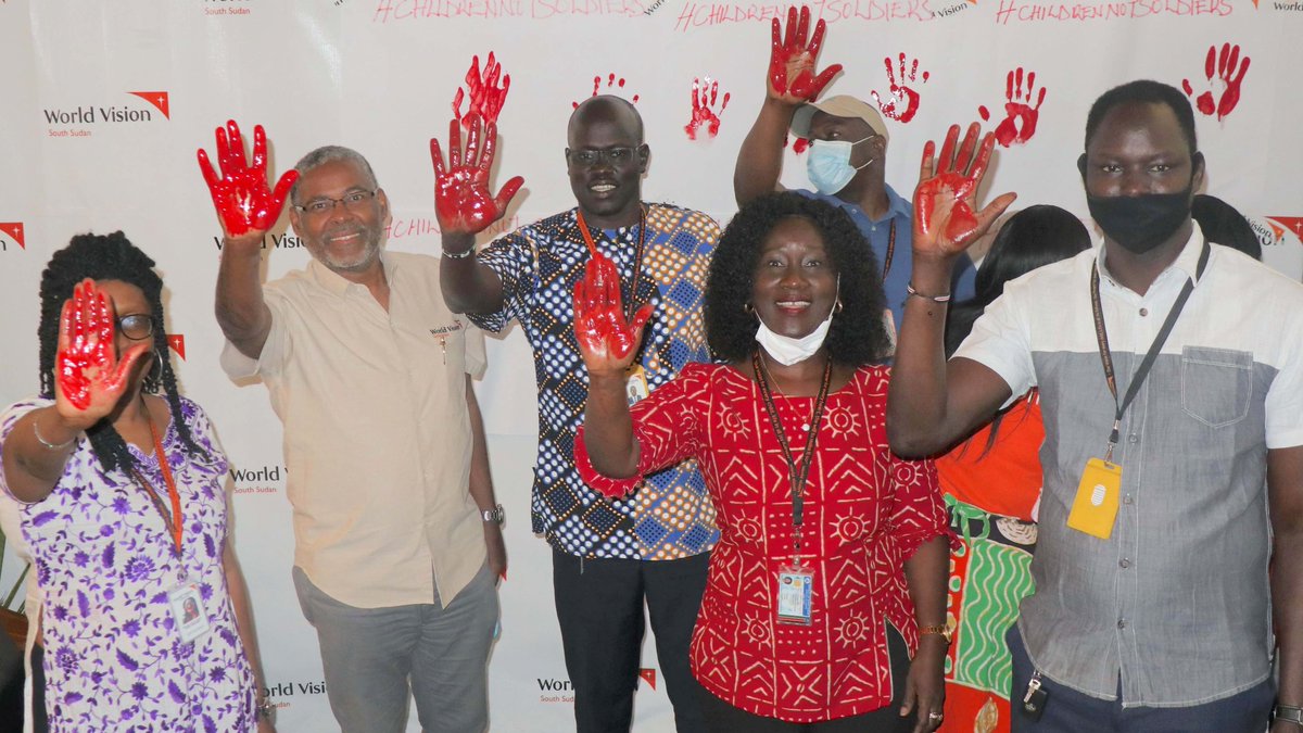WVSouthSudan's tweet photo. #ChildNOTSoldier: World Vision's team led by Country Director Dr. @MesfinLoha raise hands on #RedHandDay to pledge commitment to stop the practice &amp; uphold protection of children in #SouthSudan.

#ItTakesANation to #endviolence and #stop recruitment of children as soldiers. #SSOT https://t.co/lNirX6Brg8