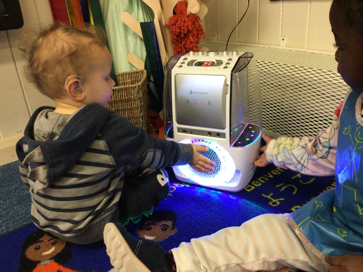 Nurseryboule's tweet image. Our music with lights and water was of great interest to some of the children this morning. Alex enjoyed feeling the vibrations from the sound. #ExploringMedia