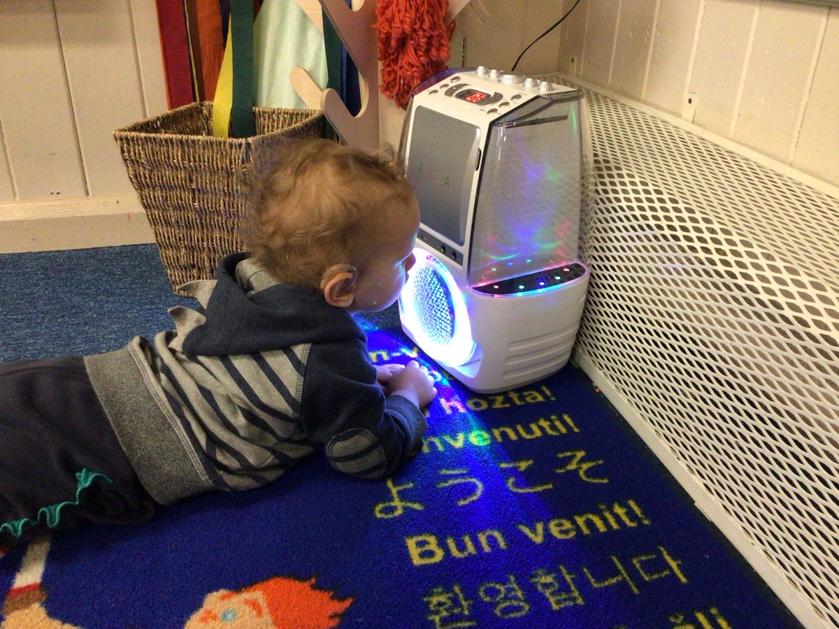 Nurseryboule's tweet image. Our music with lights and water was of great interest to some of the children this morning. Alex enjoyed feeling the vibrations from the sound. #ExploringMedia