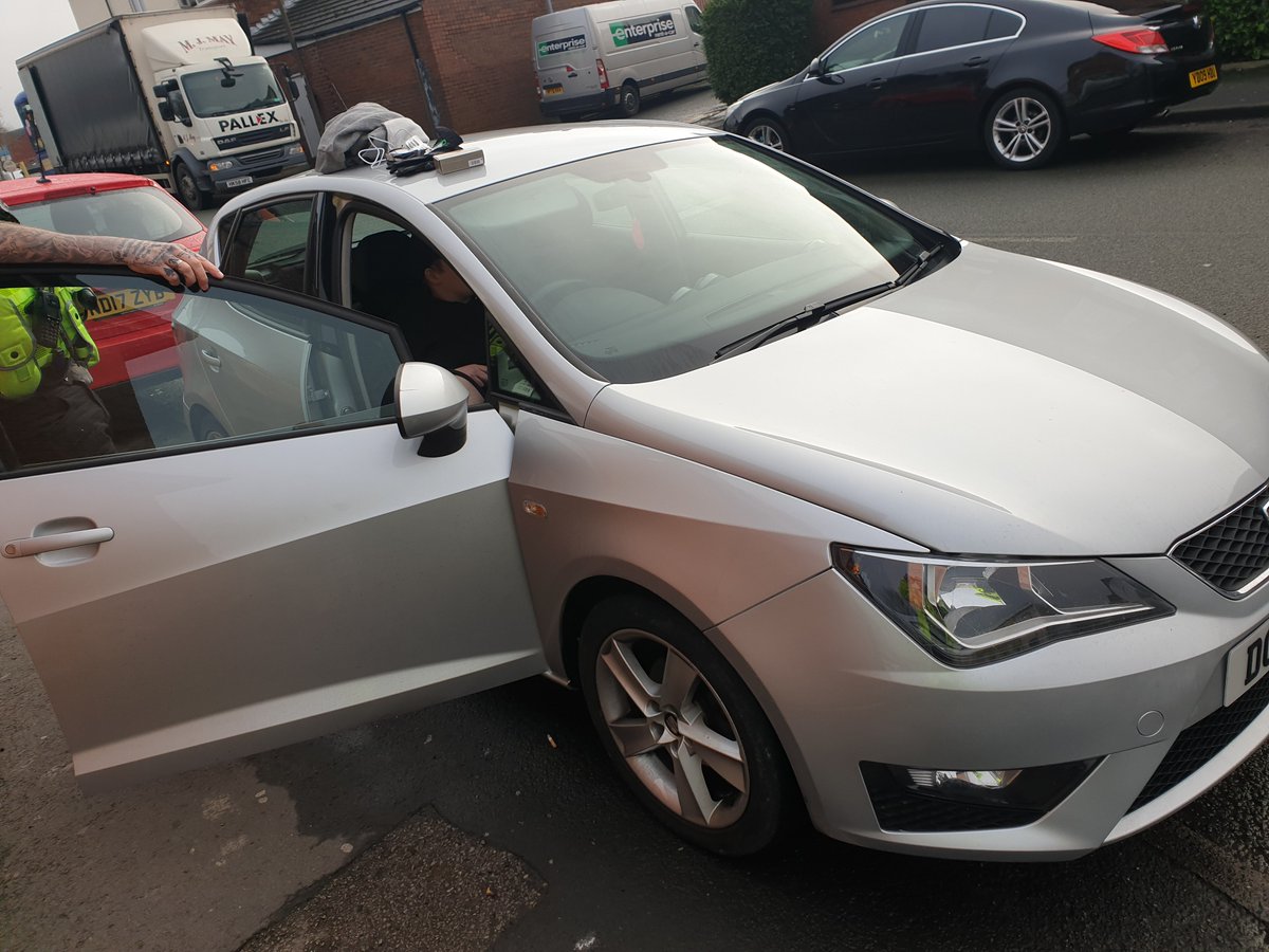 gmptraffic's tweet photo. The driver of this Seat Ibiza didnt notice our unmarked #XT11 patrol. Bet they wish they had... stopping on Frederick St Farnworth the driver was detained. Found to be disqualified. Car stolen by means of robbery from Bolton on 7th Feb. #Arrested car being returned to owner https://t.co/4og48mnf1E