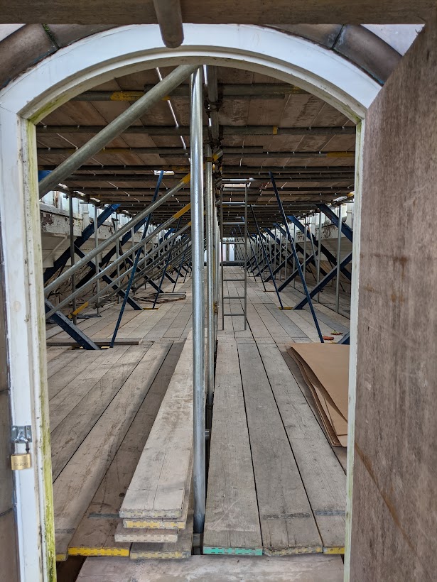 WithingtonBaths's tweet photo. Week 4 of our refurbishment project. Internal scaffolding &amp; temporary lighting complete &amp; the pool back open &amp; busy as ever. Investigation of the extent of decayed high level timber begins.  Discovered rope was originally used to seal the glazed lantern frames 1911, who knew..... https://t.co/zVlHXcXmPy