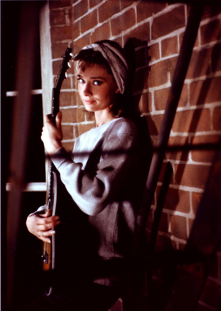 Audrey Hepburn photographed during the production of Breakfast at Tiffany's, 1961 #GetOutYourGuitarDay