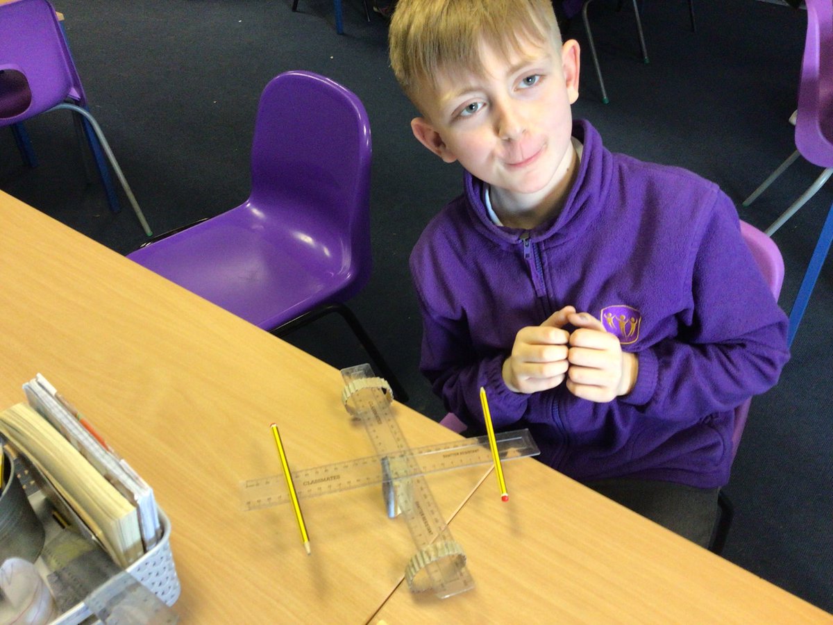 In science, we investigated levers, pulleys and gears. We made levers using a ruler and a whiteboard rubber. We used corrugated cardboard to make gears.