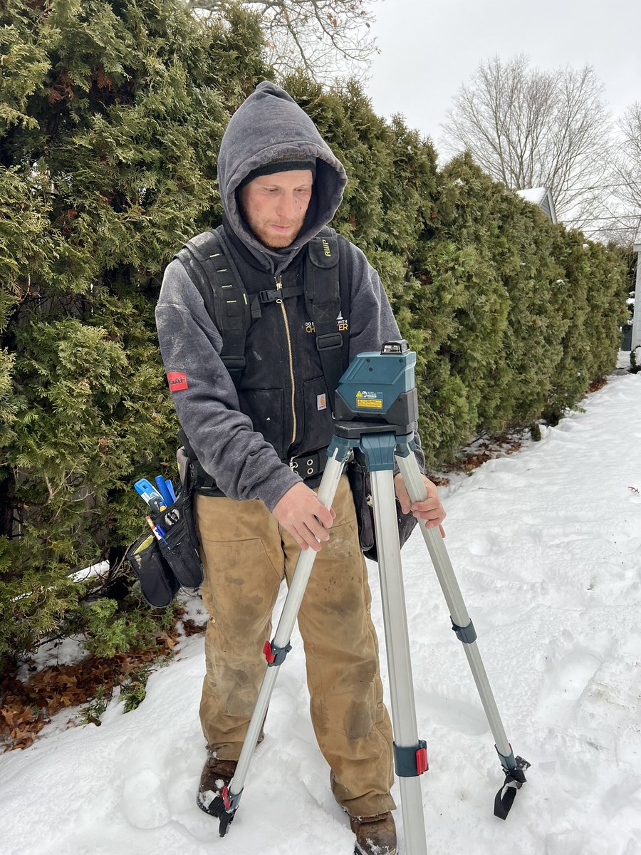 Our experienced team getting ready to layout siding elevations using laser leveling. #Kalamazoo #ExperiencedContractor #DoeverythingwithCharacter